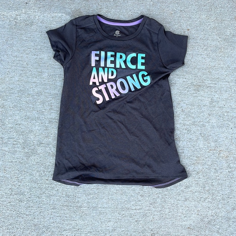 Grey champion tee shirt. “Fierce and strong”